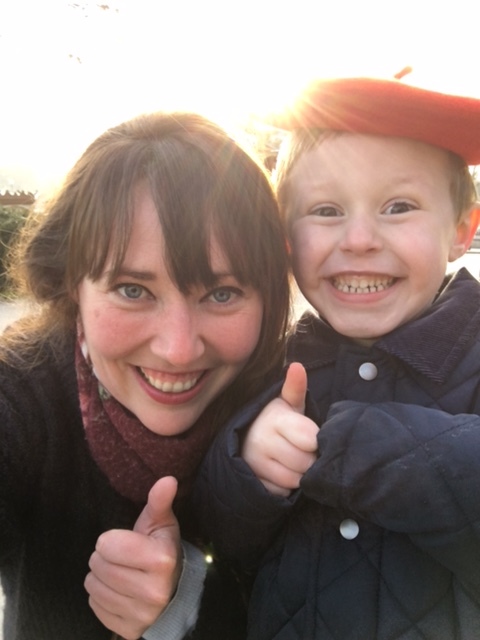 Krystal in Paris gives the thumbs-up after a fun shoot with Henry and his family.