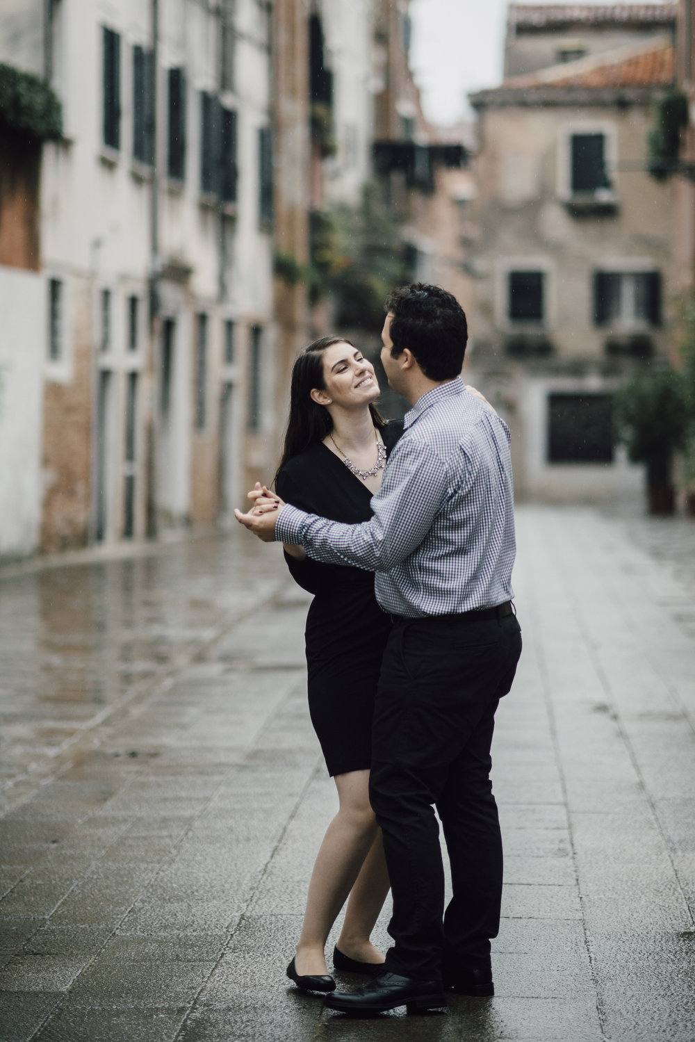  Dancing in the rain, in Venice, on a quiet side street. NOT a photo you can get with a selfie stick! 